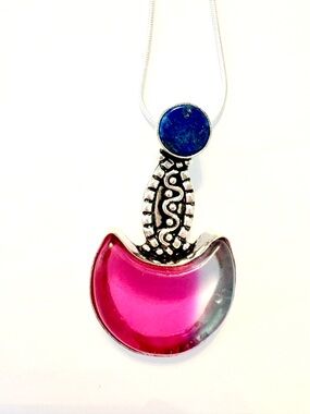 1 1/2 inch, Bi Color Tourmaline and  Lapis  Lazuli pendant on a silver chain.